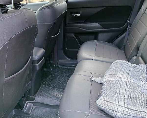 Синий Мицубиси Аутлендер, объемом двигателя 2 л и пробегом 68 тыс. км за 22000 $, фото 23 на Automoto.ua