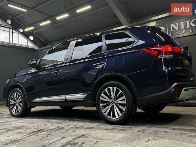 Синий Мицубиси Аутлендер, объемом двигателя 2 л и пробегом 62 тыс. км за 20500 $, фото 11 на Automoto.ua