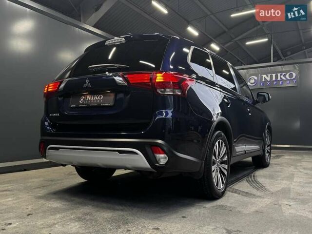 Синий Мицубиси Аутлендер, объемом двигателя 2 л и пробегом 62 тыс. км за 20500 $, фото 16 на Automoto.ua
