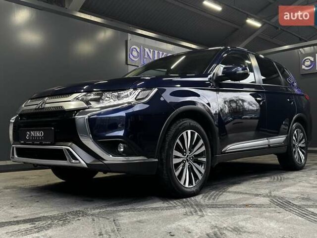 Синий Мицубиси Аутлендер, объемом двигателя 2 л и пробегом 62 тыс. км за 20500 $, фото 7 на Automoto.ua