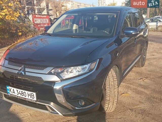Синий Мицубиси Аутлендер, объемом двигателя 2 л и пробегом 21 тыс. км за 23600 $, фото 5 на Automoto.ua