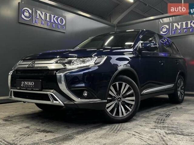 Синий Мицубиси Аутлендер, объемом двигателя 2 л и пробегом 62 тыс. км за 20500 $, фото 5 на Automoto.ua