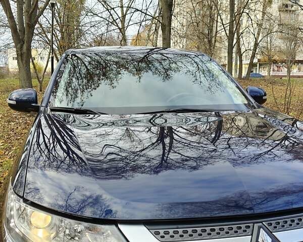 Синий Мицубиси Аутлендер, объемом двигателя 2 л и пробегом 68 тыс. км за 22000 $, фото 2 на Automoto.ua