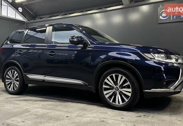 Синий Мицубиси Аутлендер, объемом двигателя 2 л и пробегом 62 тыс. км за 20500 $, фото 22 на Automoto.ua