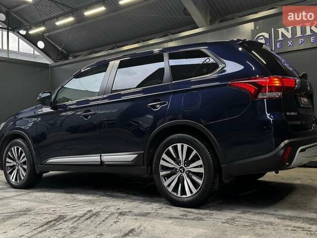 Синий Мицубиси Аутлендер, объемом двигателя 2 л и пробегом 62 тыс. км за 20500 $, фото 10 на Automoto.ua