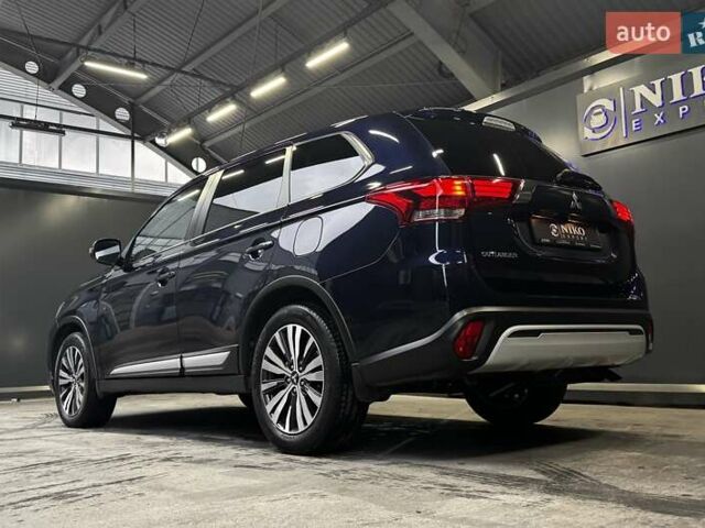 Синий Мицубиси Аутлендер, объемом двигателя 2 л и пробегом 62 тыс. км за 20500 $, фото 13 на Automoto.ua