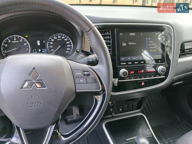 Синий Мицубиси Аутлендер, объемом двигателя 2 л и пробегом 68 тыс. км за 22000 $, фото 30 на Automoto.ua