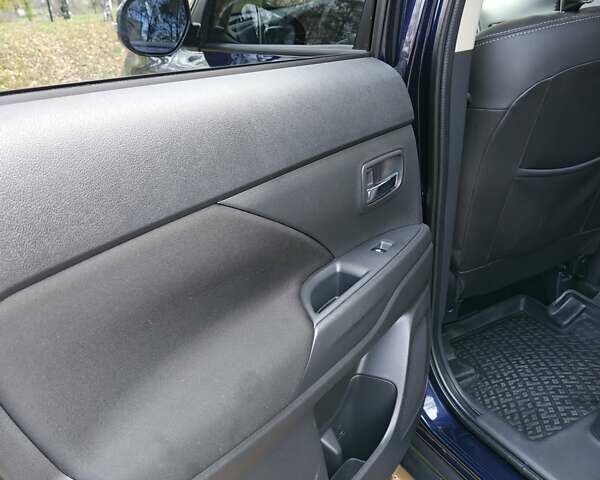 Синий Мицубиси Аутлендер, объемом двигателя 2 л и пробегом 68 тыс. км за 22000 $, фото 24 на Automoto.ua