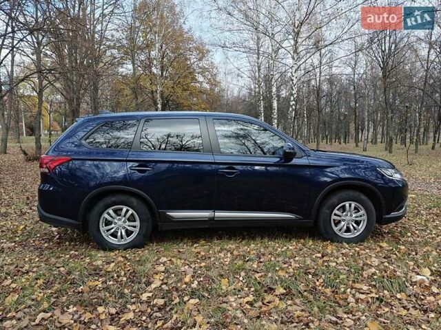 Синий Мицубиси Аутлендер, объемом двигателя 2 л и пробегом 68 тыс. км за 22000 $, фото 8 на Automoto.ua