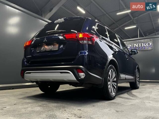 Синий Мицубиси Аутлендер, объемом двигателя 2 л и пробегом 62 тыс. км за 20500 $, фото 17 на Automoto.ua