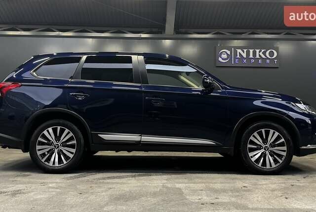 Синий Мицубиси Аутлендер, объемом двигателя 2 л и пробегом 62 тыс. км за 20500 $, фото 21 на Automoto.ua