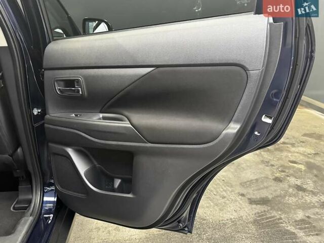 Синий Мицубиси Аутлендер, объемом двигателя 2 л и пробегом 62 тыс. км за 20500 $, фото 26 на Automoto.ua