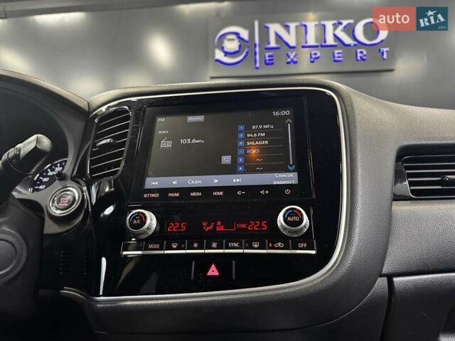 Синий Мицубиси Аутлендер, объемом двигателя 2 л и пробегом 62 тыс. км за 20500 $, фото 34 на Automoto.ua