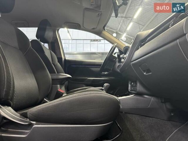 Синий Мицубиси Аутлендер, объемом двигателя 2 л и пробегом 62 тыс. км за 20500 $, фото 4 на Automoto.ua