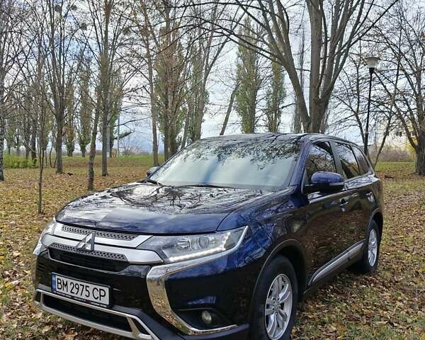 Синий Мицубиси Аутлендер, объемом двигателя 2 л и пробегом 68 тыс. км за 22000 $, фото 17 на Automoto.ua