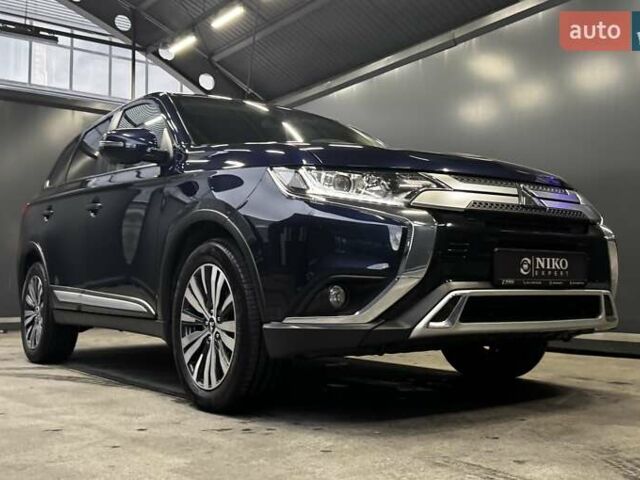 Синий Мицубиси Аутлендер, объемом двигателя 2 л и пробегом 62 тыс. км за 20500 $, фото 24 на Automoto.ua