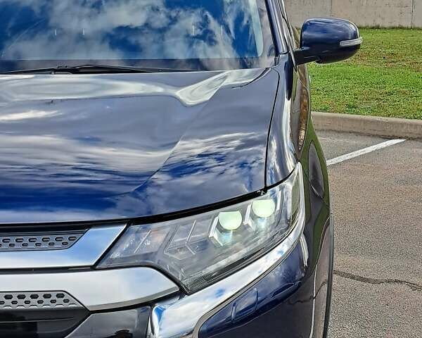 Синій Міцубісі Аутлендер, об'ємом двигуна 2.36 л та пробігом 76 тис. км за 24700 $, фото 6 на Automoto.ua