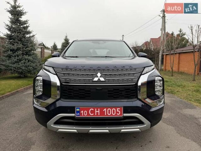 Синий Мицубиси Аутлендер, объемом двигателя 2.5 л и пробегом 80 тыс. км за 24800 $, фото 2 на Automoto.ua