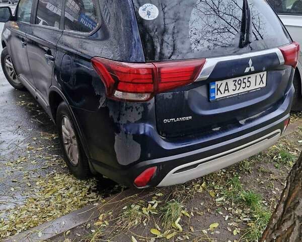 Синий Мицубиси Аутлендер, объемом двигателя 2 л и пробегом 73 тыс. км за 28500 $, фото 1 на Automoto.ua