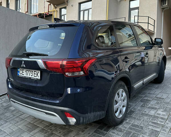 Синій Міцубісі Аутлендер, об'ємом двигуна 2 л та пробігом 51 тис. км за 21500 $, фото 1 на Automoto.ua