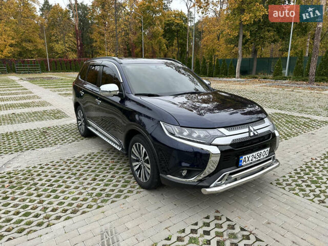 Синий Мицубиси Аутлендер, объемом двигателя 2.36 л и пробегом 47 тыс. км за 19500 $, фото 4 на Automoto.ua