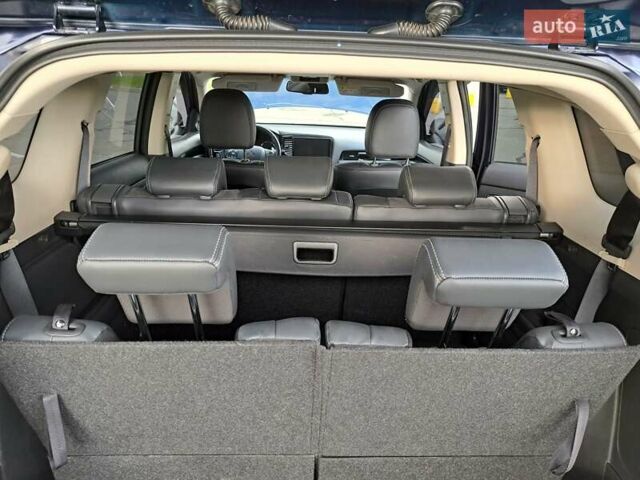 Синій Міцубісі Аутлендер, об'ємом двигуна 2.36 л та пробігом 76 тис. км за 24700 $, фото 32 на Automoto.ua