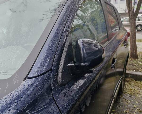 Синий Мицубиси Аутлендер, объемом двигателя 2 л и пробегом 73 тыс. км за 28500 $, фото 8 на Automoto.ua