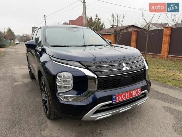 Синий Мицубиси Аутлендер, объемом двигателя 2.5 л и пробегом 80 тыс. км за 24800 $, фото 1 на Automoto.ua