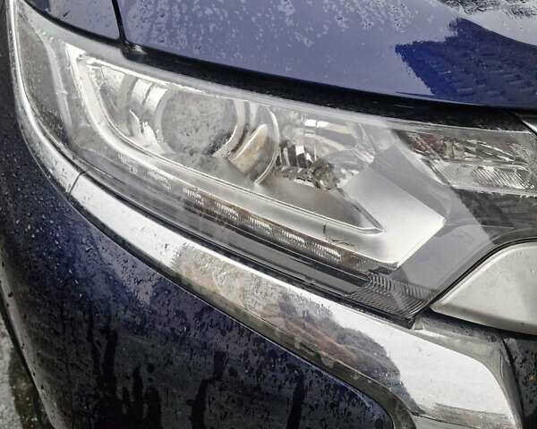 Синий Мицубиси Аутлендер, объемом двигателя 2 л и пробегом 73 тыс. км за 28500 $, фото 6 на Automoto.ua