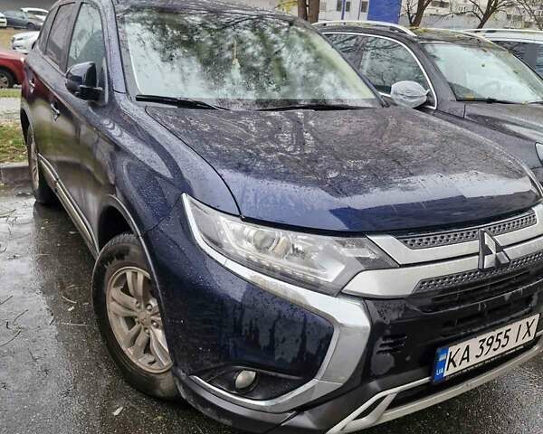 Синий Мицубиси Аутлендер, объемом двигателя 2 л и пробегом 73 тыс. км за 28500 $, фото 3 на Automoto.ua