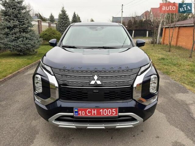 Синий Мицубиси Аутлендер, объемом двигателя 2.5 л и пробегом 80 тыс. км за 24800 $, фото 3 на Automoto.ua