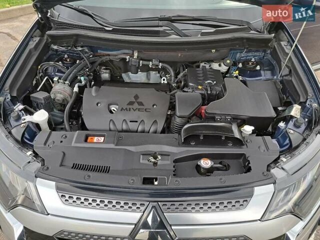 Синій Міцубісі Аутлендер, об'ємом двигуна 2.36 л та пробігом 76 тис. км за 24700 $, фото 33 на Automoto.ua