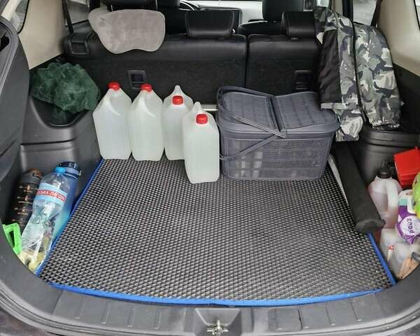 Синий Мицубиси Аутлендер, объемом двигателя 2 л и пробегом 73 тыс. км за 28500 $, фото 5 на Automoto.ua