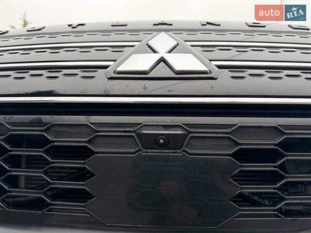 Синий Мицубиси Аутлендер, объемом двигателя 2.5 л и пробегом 80 тыс. км за 24800 $, фото 16 на Automoto.ua