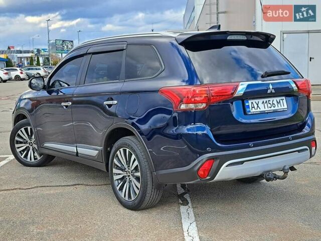 Синій Міцубісі Аутлендер, об'ємом двигуна 2.36 л та пробігом 76 тис. км за 24700 $, фото 2 на Automoto.ua