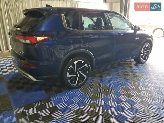 Синий Мицубиси Аутлендер, объемом двигателя 2.49 л и пробегом 88 тыс. км за 19500 $, фото 3 на Automoto.ua