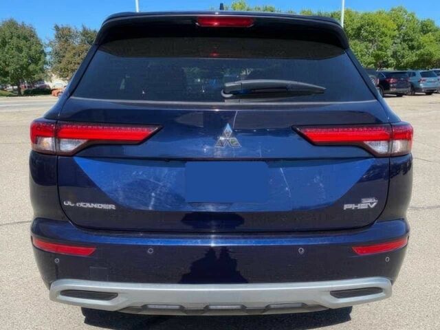 Синий Мицубиси Аутлендер, объемом двигателя 0 л и пробегом 13 тыс. км за 14500 $, фото 6 на Automoto.ua