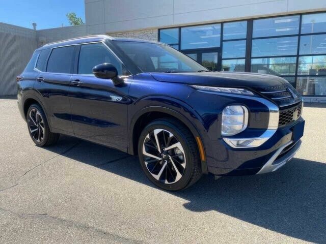 Синий Мицубиси Аутлендер, объемом двигателя 0 л и пробегом 13 тыс. км за 14500 $, фото 2 на Automoto.ua