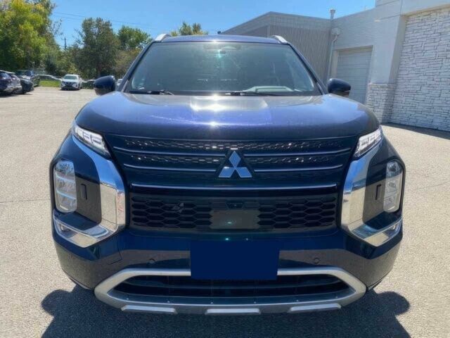 Синий Мицубиси Аутлендер, объемом двигателя 0 л и пробегом 13 тыс. км за 14500 $, фото 1 на Automoto.ua