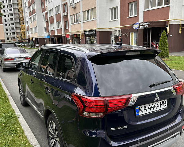 Синий Мицубиси Аутлендер, объемом двигателя 2.36 л и пробегом 47 тыс. км за 34000 $, фото 1 на Automoto.ua