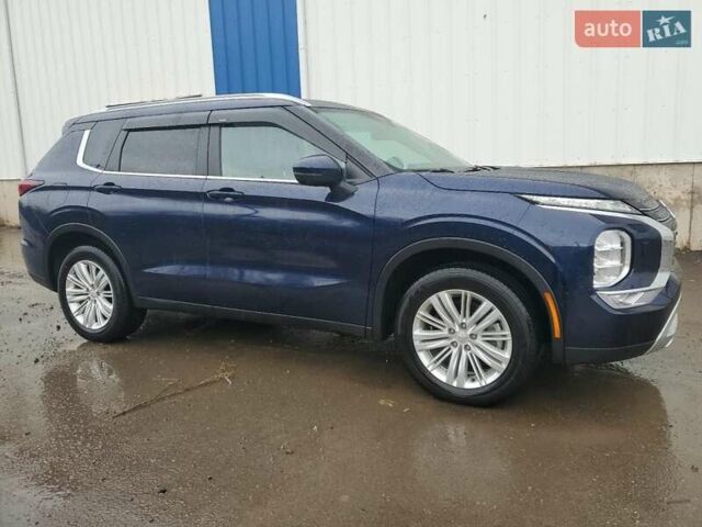 Синий Мицубиси Аутлендер, объемом двигателя 2.49 л и пробегом 10 тыс. км за 9400 $, фото 3 на Automoto.ua