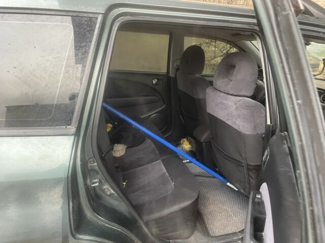 Зелений Міцубісі Аутлендер, об'ємом двигуна 2.4 л та пробігом 3 тис. км за 5000 $, фото 2 на Automoto.ua