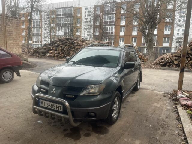 Зелений Міцубісі Аутлендер, об'ємом двигуна 2.4 л та пробігом 3 тис. км за 5000 $, фото 1 на Automoto.ua