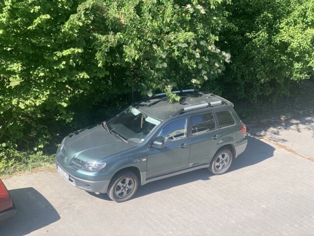 Зеленый Мицубиси Аутлендер, объемом двигателя 2 л и пробегом 220 тыс. км за 6000 $, фото 8 на Automoto.ua