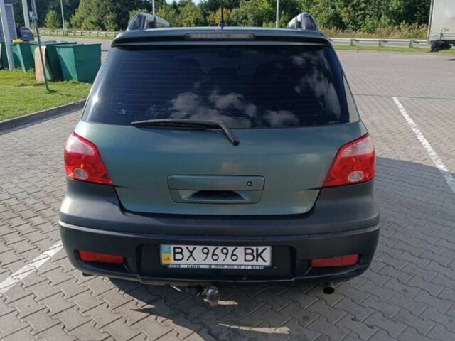 Зелений Міцубісі Аутлендер, об'ємом двигуна 2 л та пробігом 173 тис. км за 5400 $, фото 2 на Automoto.ua