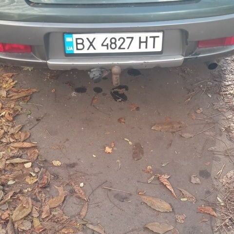 Зеленый Мицубиси Аутлендер, объемом двигателя 2 л и пробегом 220 тыс. км за 6000 $, фото 1 на Automoto.ua