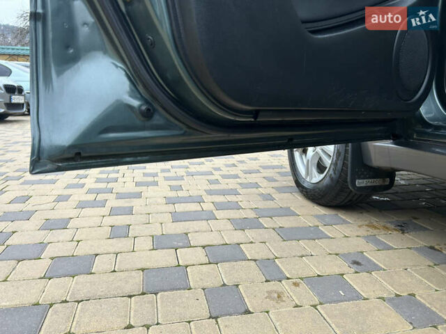 Зеленый Мицубиси Аутлендер, объемом двигателя 2.38 л и пробегом 250 тыс. км за 7200 $, фото 46 на Automoto.ua