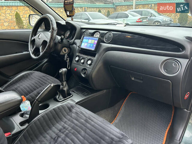 Зеленый Мицубиси Аутлендер, объемом двигателя 2.38 л и пробегом 250 тыс. км за 7200 $, фото 10 на Automoto.ua