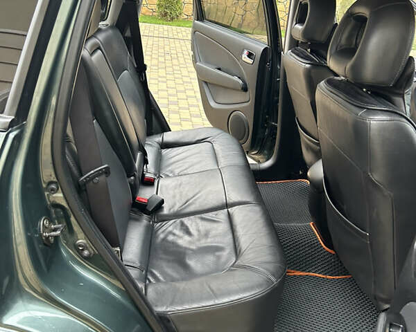 Зеленый Мицубиси Аутлендер, объемом двигателя 2.38 л и пробегом 250 тыс. км за 7200 $, фото 37 на Automoto.ua