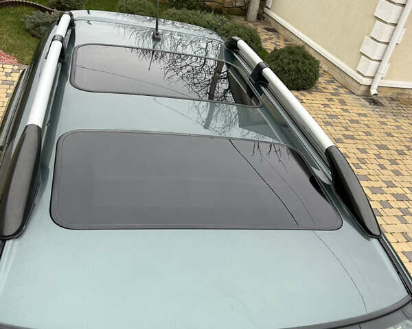 Зеленый Мицубиси Аутлендер, объемом двигателя 2.38 л и пробегом 250 тыс. км за 7200 $, фото 16 на Automoto.ua